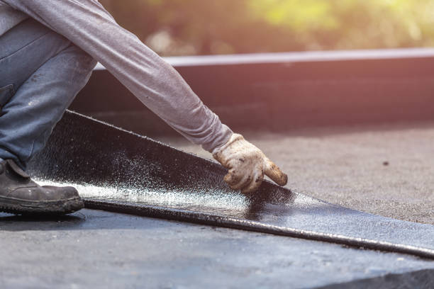Professional Basement Waterproofing technician working in Mongo, IN